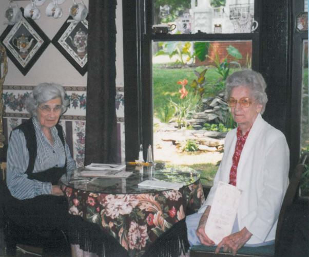 Miss Mabel's Tea Room, July 23, 1999 (L to R) Miss Elizabeth Shute Cowles (1910-2003), Mrs. Lula Belle Parker Austin (1908-2007)